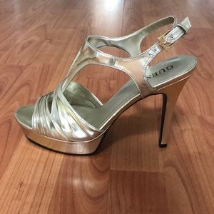 Never worn Guess gold platform heels
